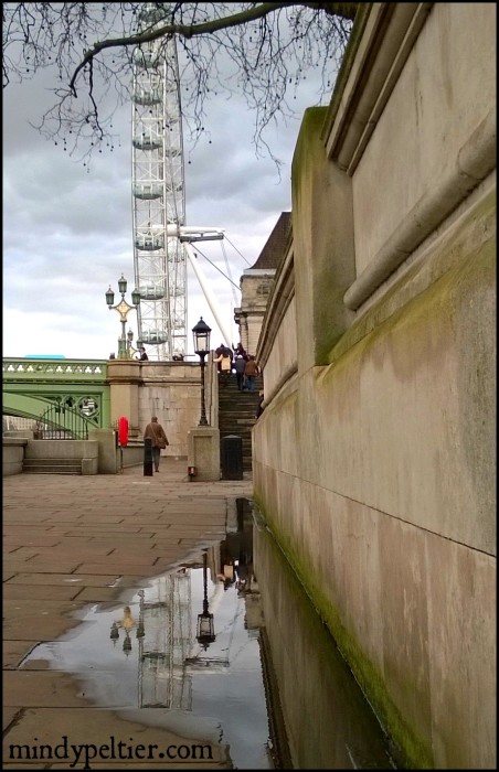 The London Eye reflected in a London puddle. Photo by @MindyJPeltier.