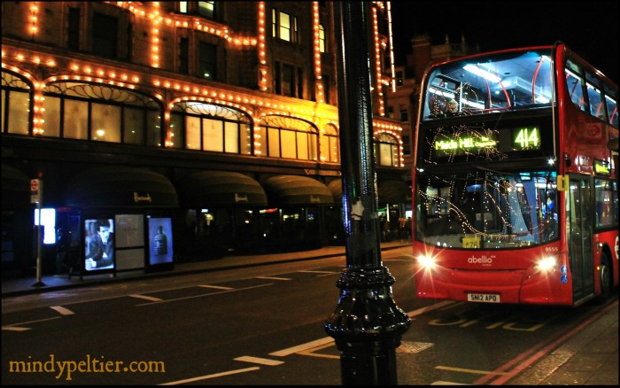 Night Lights of Harrods Reflected on a London city bus. Photo by @MindyJPeltier